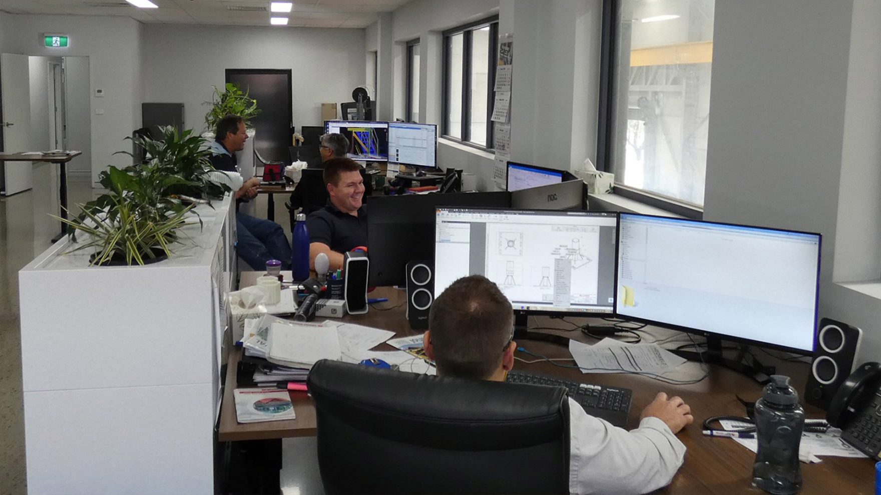 Mecensol services team working on projects